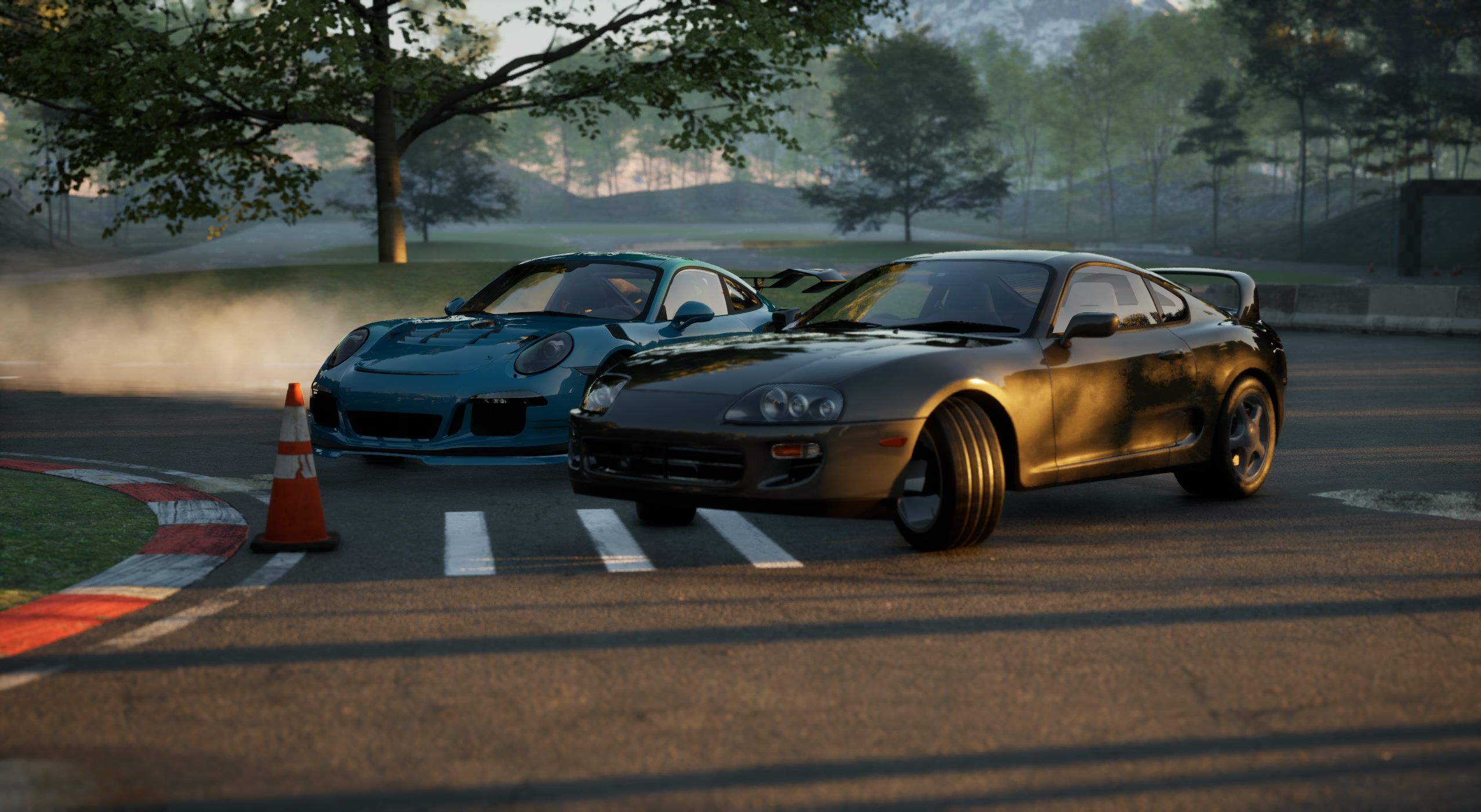 Leader and chaser at a cone in low golden light
