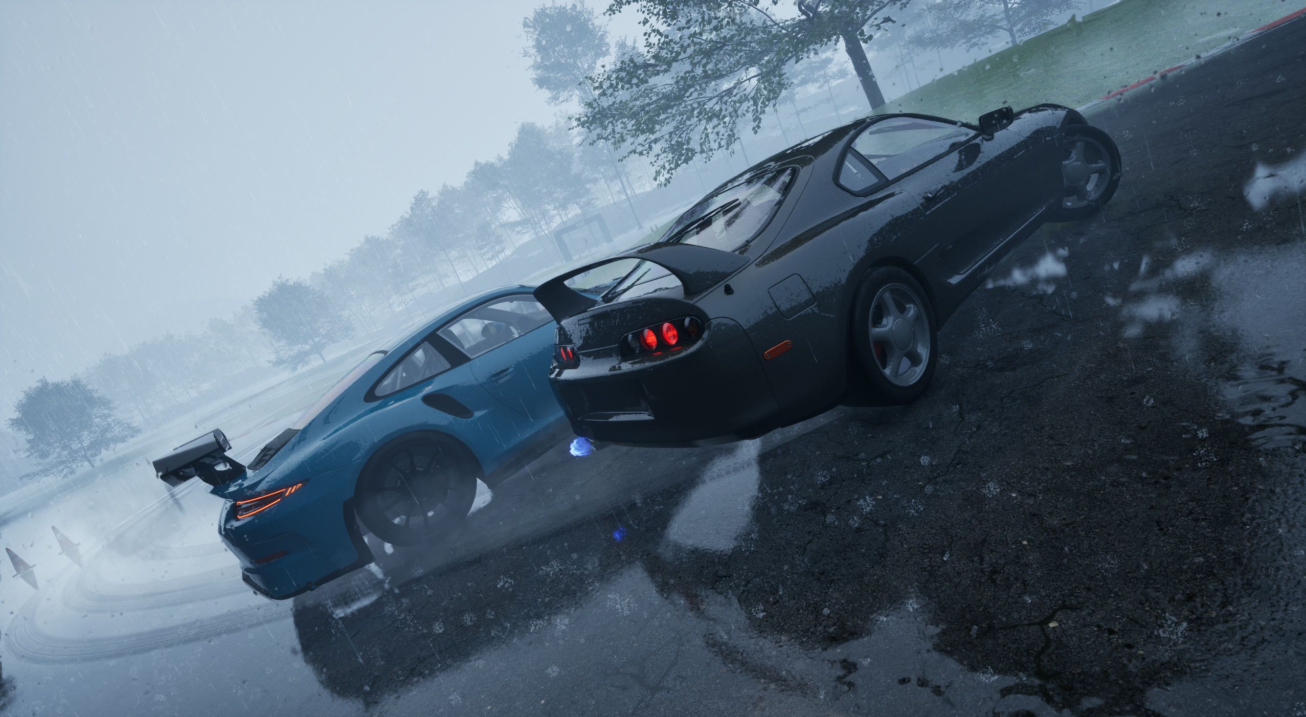 Black chaser door to door with the teal car in heavy fog